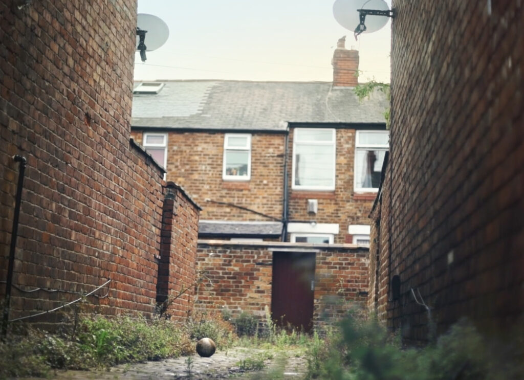 A football on an empty Manchester street